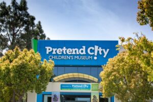 Pretend city childrens museum store front sign