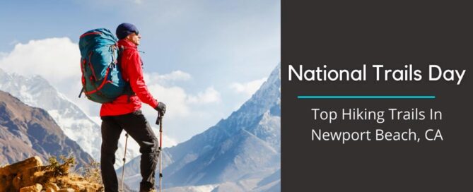 person hiking standing at the top of a ridge