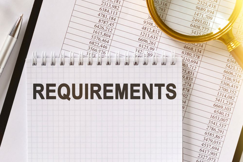 REQUIREMENTS text in a notebook with lens