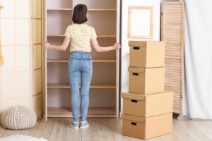 Young woman checking closet