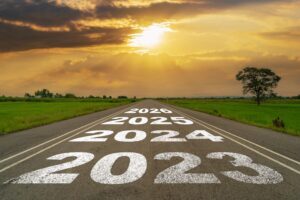 2023 2026 written on highway road