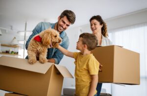 family with pet in new home
