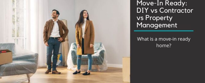 A couple looking for a rental property standing in a living room looking around