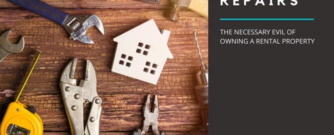 a model house surrounded by hand tools