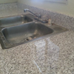 shot of a clean new kitchen sink and counter