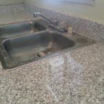 Shot of a clean new kitchen sink and counter