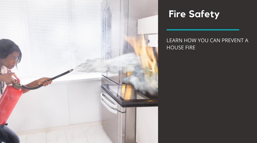 woman putting out a stove fire with a fire extinguisher