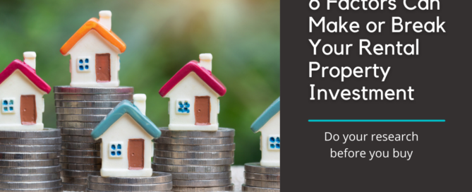 Toy houses stacked on coins.