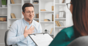 Rental fraud financial losses landlord reviewing unpaid rent paperwork